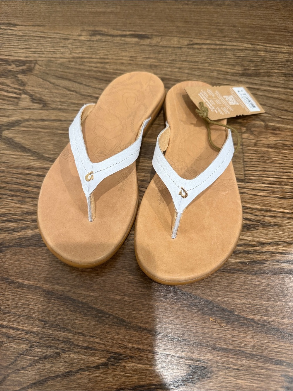 OluKai White Leather Strap Tan Footbed Thongs
